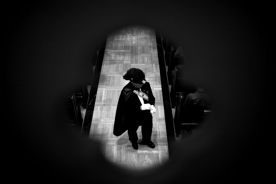 A member of the Knights of Columbus walks back to his seat before the start of a Diocesan Anniversary Mass on Sunday, Sept. 26, 2010, at the Cathedral of St. Mary of the Immaculate Conception.