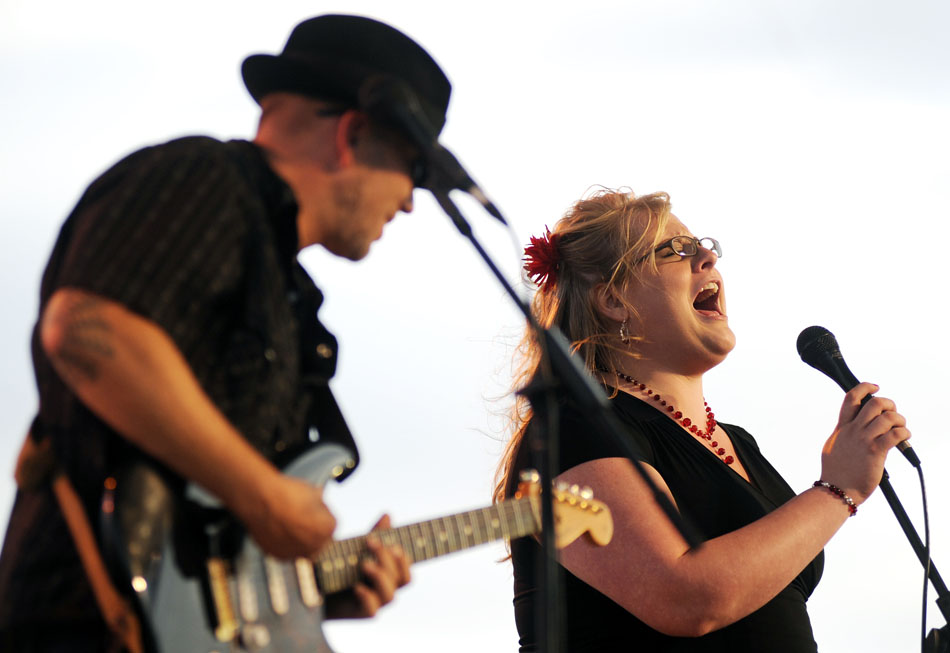 Mallory Coons, right, hits a high note performing with Big Silver Derailed on Friday, Sept. 3, 2010, at the Illinois Blues Festival on the Riverfront.