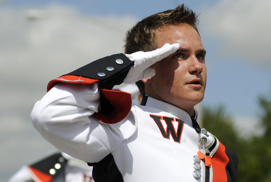 Washington High School drum major Aaron Walker salutes the judges during the parade portion of the Marching Panther Invitational on Saturday, Sept. 11, 2010, in Washington.