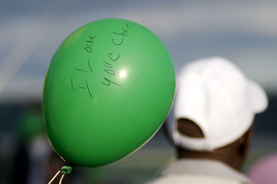 A message is seen written on a balloon before a launch during the National Day of Remembrance on Sunday, Sept. 26, 2010, at the RiverPlex. The day is for grieving families and friends of people who were killed through violence.