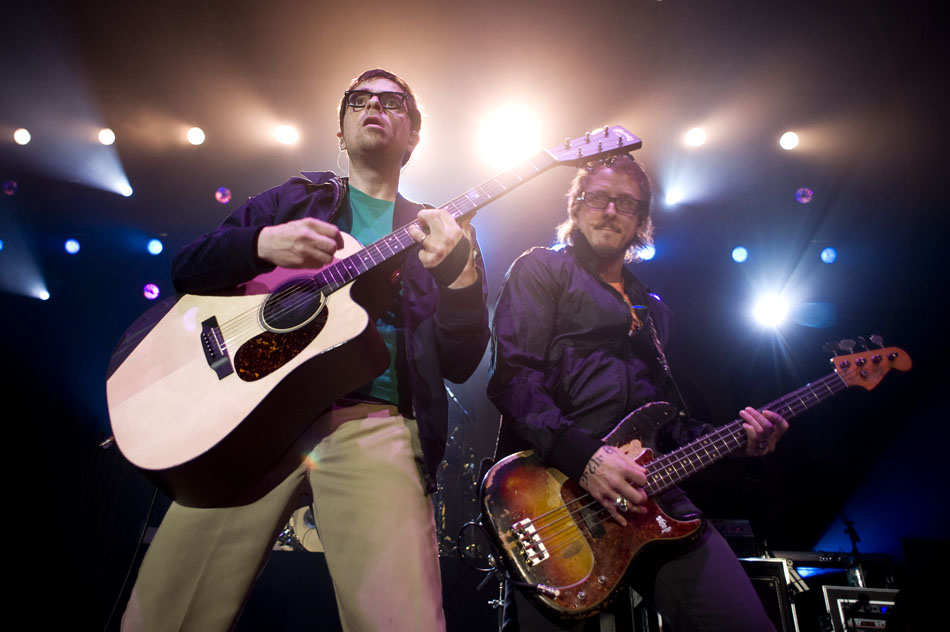 Weezer frontman Rivers Cuomo, left, performs with bassist Scott Shriner during a performance on Saturday, Sept. 25, 2010, at Bradley University.