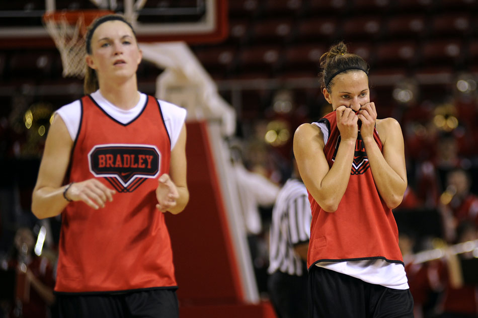 Bradley's Hanna Muegge, right, walks off the field after a team scrimmage on Sunday, Oct. 24, 2010, at the Renaissance Coliseum. The red team lost.