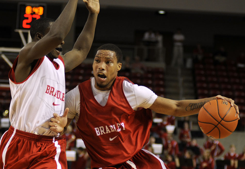 Bradley's Dyricus Simms-Edwards draws contact from a teammate during a team scrimmage on Sunday, Oct. 24, 2010, at the Renaissance Coliseum.