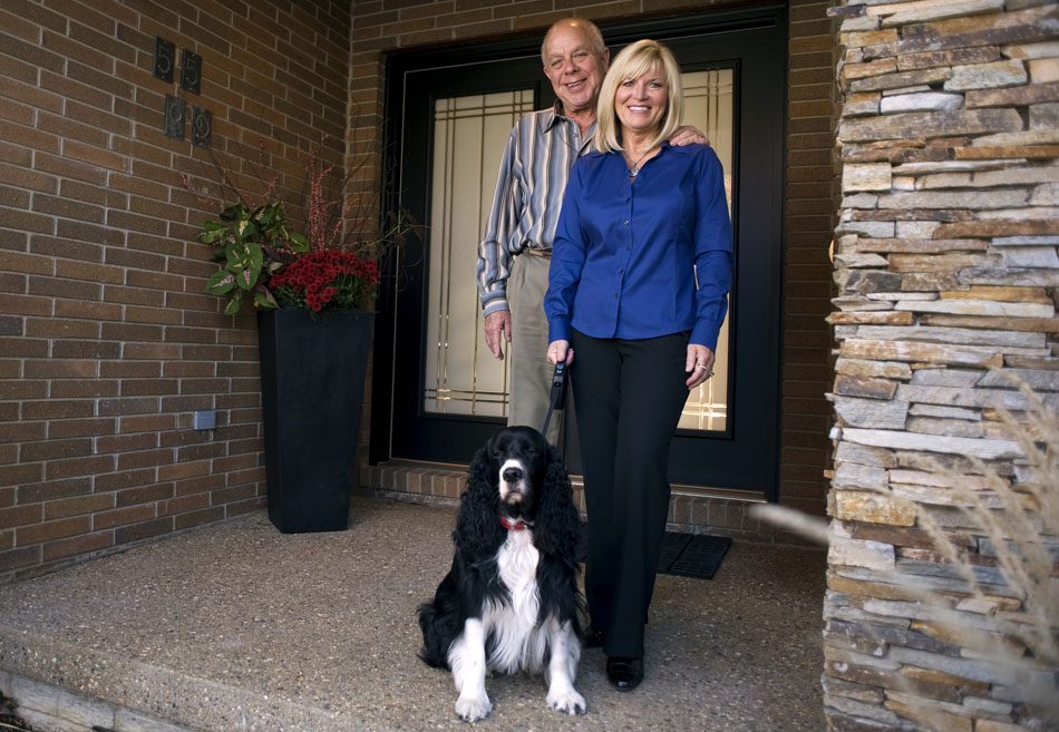 Dave and Sue Haney pose for a portrait at the front entrance of their prairie style home on Thursday, Oct. 14, 2010, in Peoria Heights.