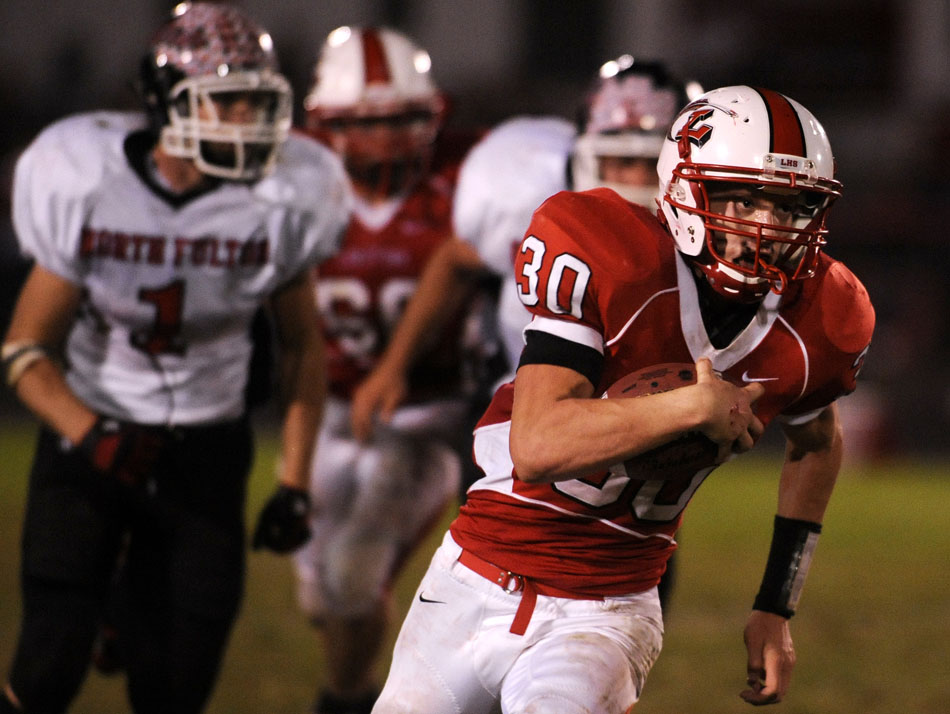 Lewistown's Zach Duncan breaks away from the pack during a game against North Fulton on Friday, Oct. 8, 2010, in Lewistown.