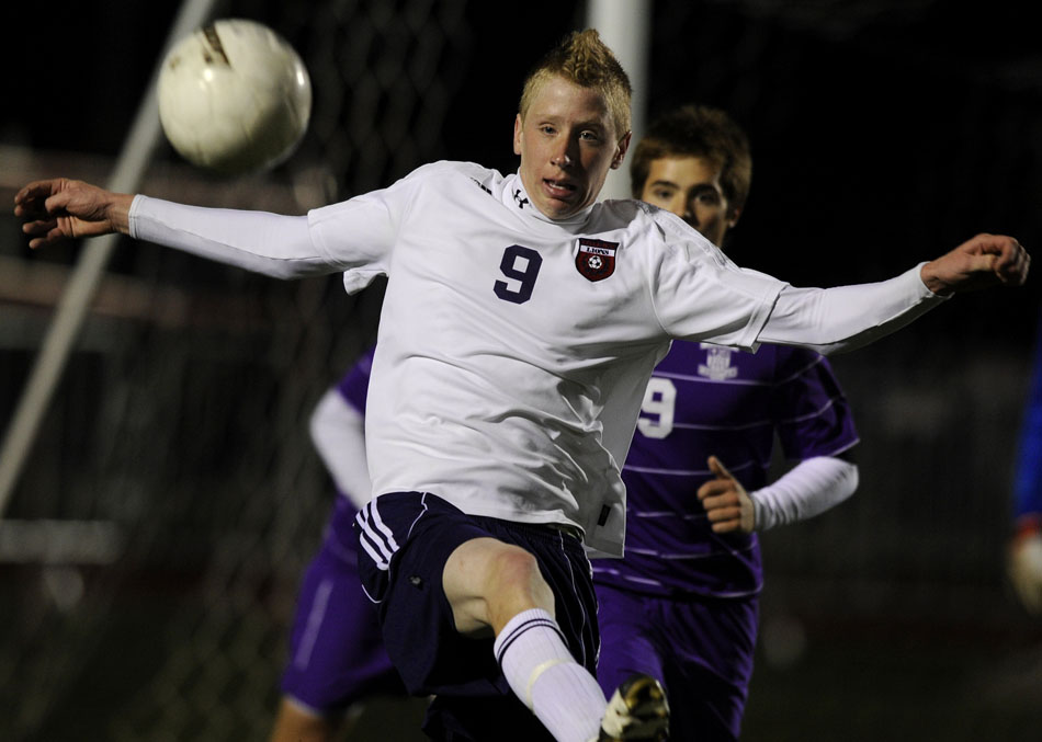 Lisle's Matt Gill looks to control the ball in front of Peoria Christian's Jonathan Lehman (9) during the Class 1A state championship on Saturday, Oct. 30, 2010, in Naperville. Lisle won 1-0.