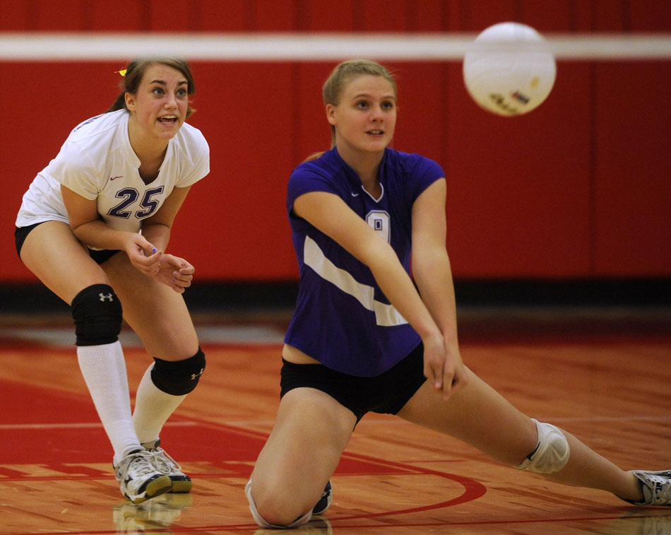 Canton's Kaley Barbknecht digs the ball in front of teammate Addy Emmons during a Class 3A semi-final against East Peoria on Thursday, Oct. 28, 2010, in Morton.