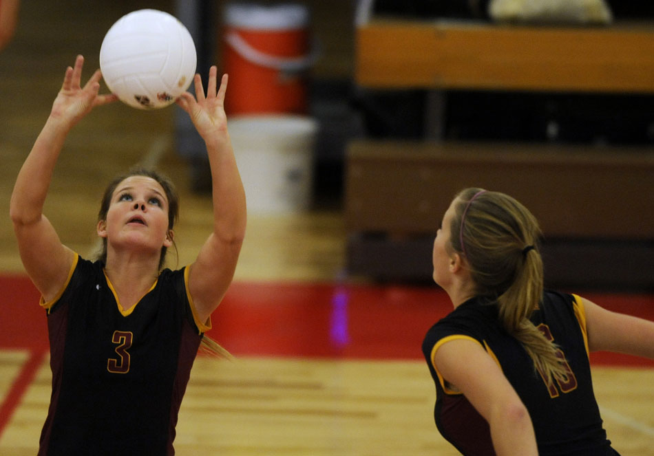 East Peoria's Becca Britton (3) sets the ball for a teammate during a Class 3A semi-final against Canton on Thursday, Oct. 28, 2010, in Morton.