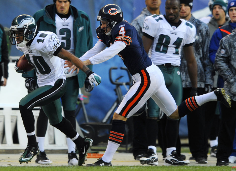 Chicago Bears punter Brad Maynard (4) forces Philadelphia Eagles wide receiver DeSean Jackson (10) out of bounds to save a would-be Eagles touchdown off of a punt during a game on Sunday, Nov. 28, 2010, at Soldier Field in Chicago. Chicago won 31-26.