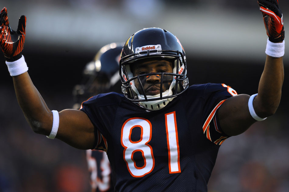 Chicago Bears wide receiver Rashied Davis (81) pumps up the crowd before a kick off during a game on Sunday, Nov. 28, 2010, at Soldier Field in Chicago.