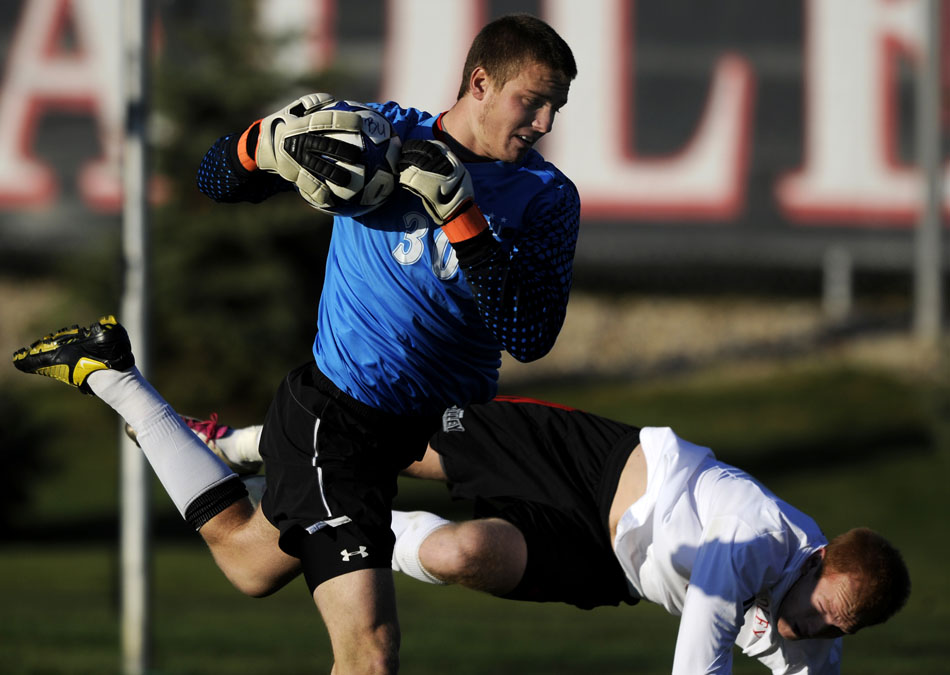 SIU Edwardsville keeper John Berner collides with Bradley's Jochen Graf as Graf plays the ball into the box during a game on Sunday, Nov. 14, 2010, at Shea Stadium.