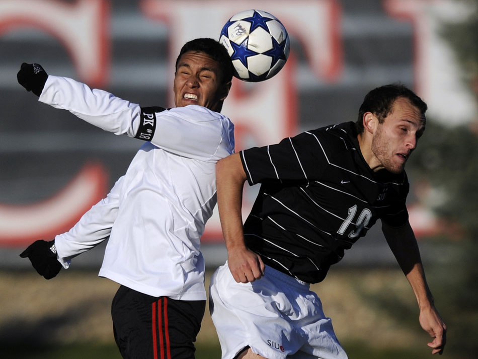 Bradley's Rudy Garcia, left, heads the ball in front of SIU Edwardsville's Chris Anzalone during a game on Sunday, Nov. 14, 2010, at Shea Stadium.