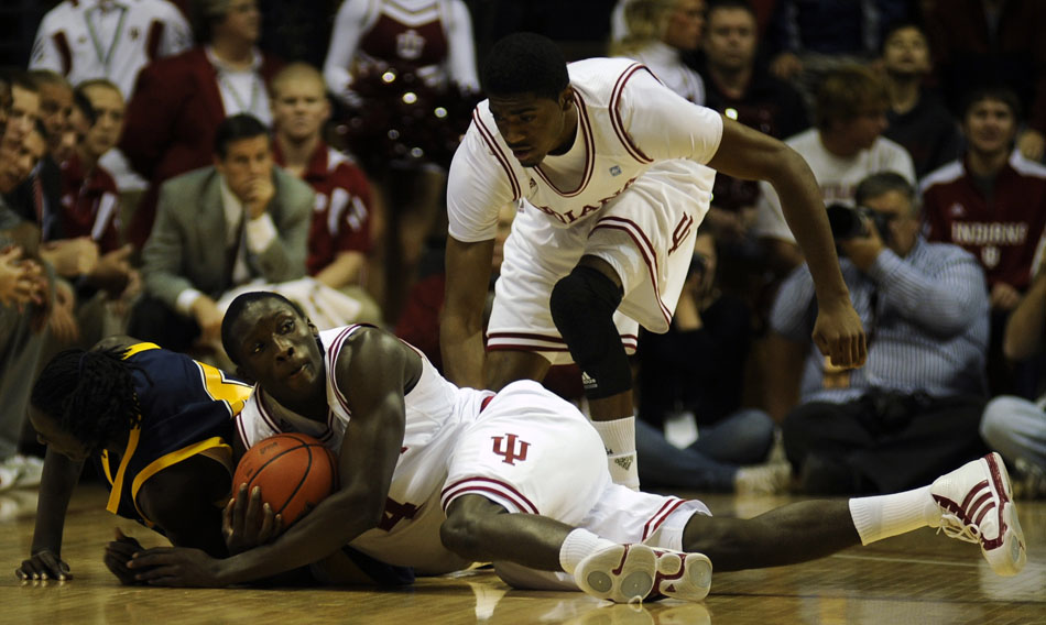 Indiana guard Victor Oladipo dives onto the court for a loose ball during a game against Franklin on Wednesday, Nov. 3, 2010, at Assembly Hall in Bloomington, Ind.