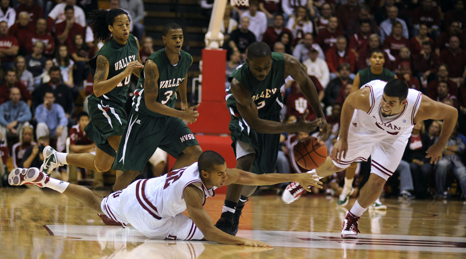 Indiana guard Verdell Jones III, left, tries to regain control of the ball in front of Mississippi Valley State's Flando Jones, middle, during a game on Tuesday, Nov. 16, 2010, at Assembly Hall.