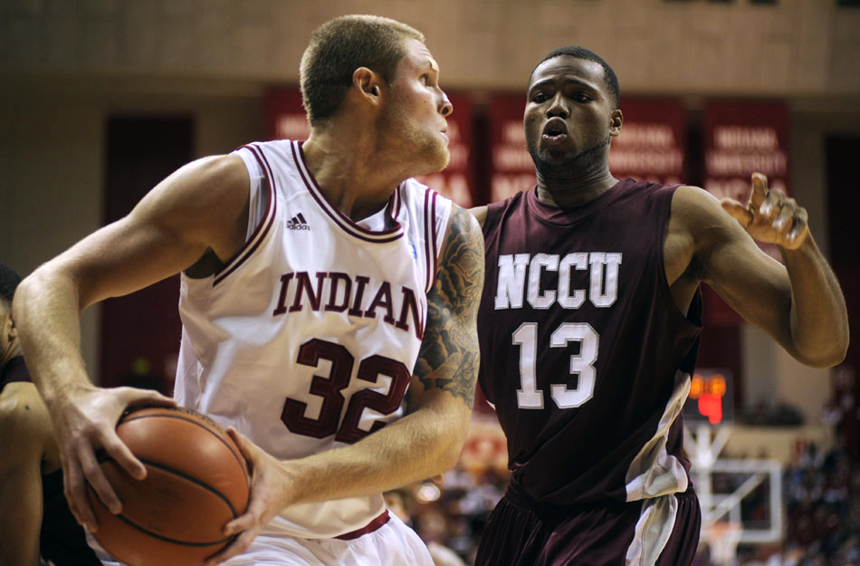 Indiana forward Derek Elston looks to pass as he is trapped in the corner by North Carolina Central's David Best during a game on Tuesday, Nov. 23, 2010, at Assembly Hall.