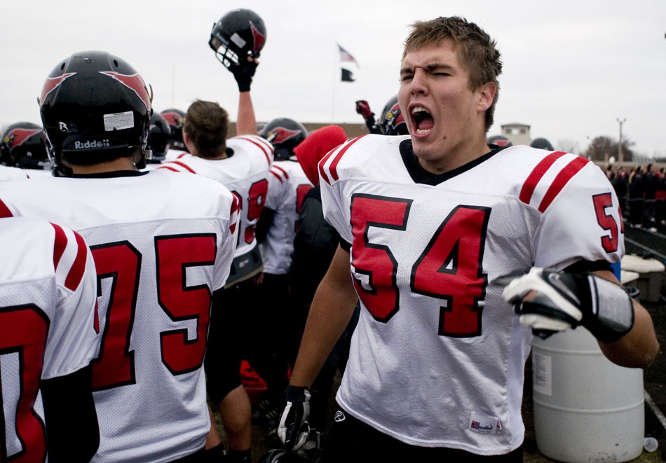 Metamora's Devin Taseff (54) celebrates a 34-7 win against Pontiac as the final seconds tick off the clock in a game on Saturday, Nov. 13, 2010, in Pontiac.