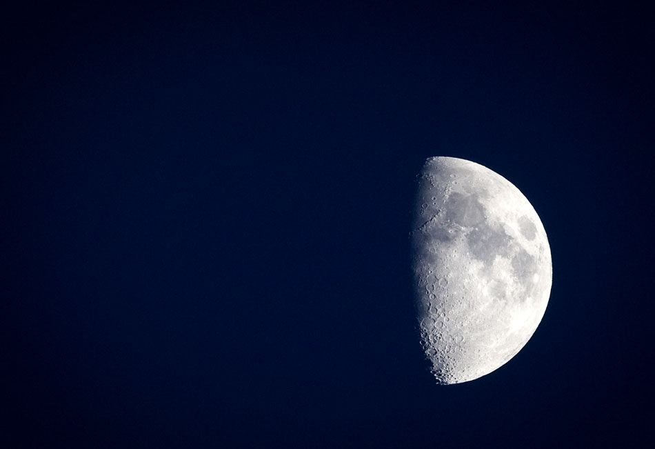 A waxing gibbous moon shines down upon Peoria on Sunday, Nov. 14, 2010. The moon phase appears at sunset high to the east about two weeks after a new moon.