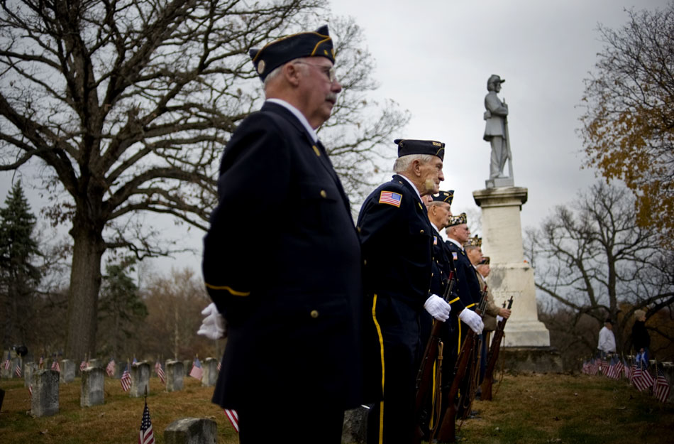 Members of the American Legion Post No. 2 observe a Veteran's Day ceremony on Thursday, Nov. 11, 2010, at Soldier's Hill in Springdale Cemetery.