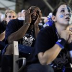 James Poscascio, a freshman at Butler, watches the action between his fingers during a viewing party of the Duke-Butler national championship game on Monday, April 5, 2010, at Hinkle Fieldhouse in Indianapolis.