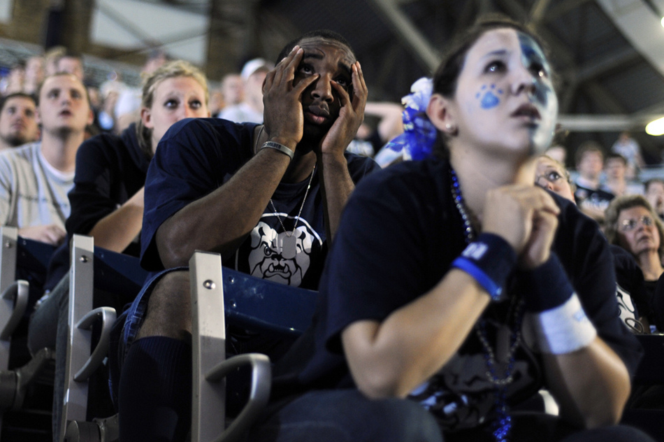 James Poscascio, a freshman at Butler, watches the action between his fingers during a viewing party of the Duke-Butler national championship game on Monday, April 5, 2010, at Hinkle Fieldhouse in Indianapolis.