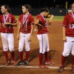 Tomball players show their disappointment after falling to Bowie 9-1 in the Class 5A softball semifinal at the University of Texas on Friday, June 4, 2010.