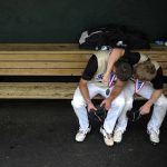 Bushland players Monty McCasland, left, and Thomas Cleveland share a moment in the dugout after a loss in the Class 2A state championship game at the University of Texas on Thursday, June 10, 2010.