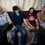 Ola Podrida band members David Hobizal, left, Andrew Kenny, David Wingo and Colin Swietek pose for a portrait in Austin on Tuesday, June 29, 2010. Pictured in middle is Wingo's dog, June Bug. The band will embark on a tour of the southern and eastern United States starting with a show at The Mohawk on July 8.