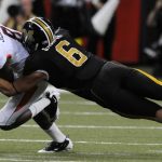 Missouri linebacker Andrew Gachkar (6) knocks a pass away from Illinois wide receiver A.J. Jenkins (8) as Jenkins crosses the middle on a slant route during a game on Saturday, Sept. 4, 2010, at the Edward Jones Dome in St. Louis.