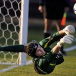 Bradley keeper Brian Billings dives to make a save in penalty kicks overtime in the Missouri Valley Conference championship game against SIU-Edwardsville on Sunday, Nov. 14, 2010, at Shea Stadium.