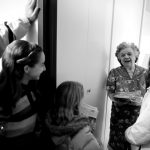 Dorothy Hathaway talks with the Reist family after receiving a Thanksgiving meal from the South Side Mission on Thursday, Nov. 25, 2010. The Reist family were one of several volunteers to deliver 1,950 meals in Peoria on Thanksgiving.