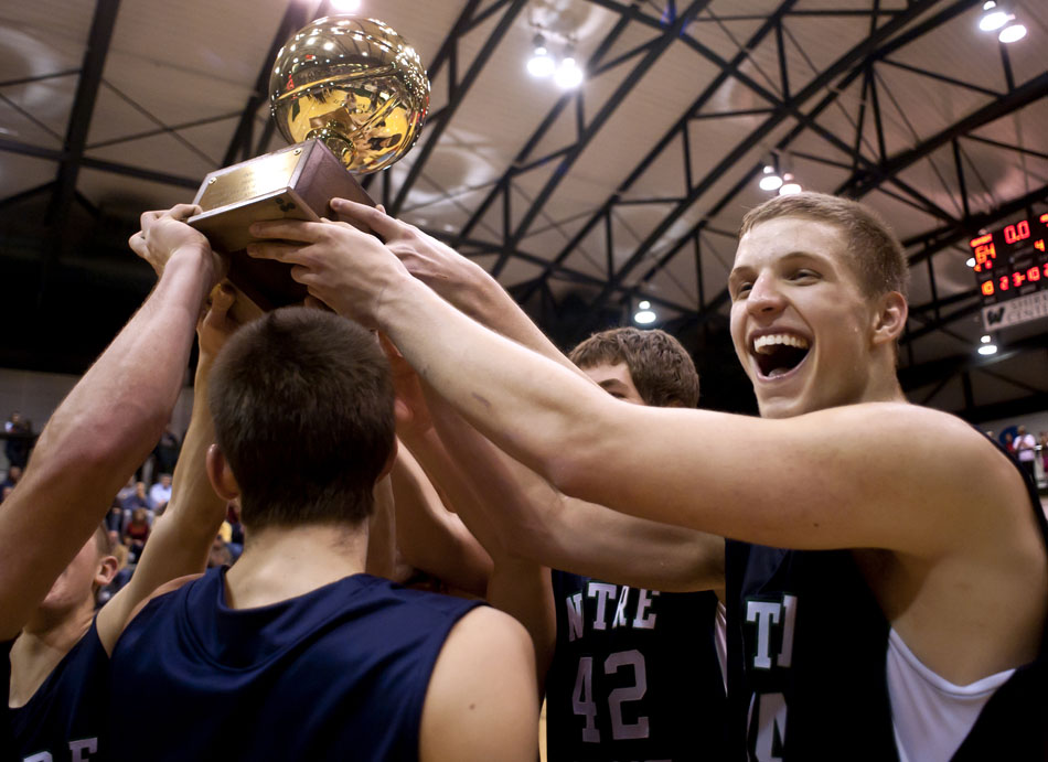 Notre Dame's Max Bielfeldt, right, celebrates with his team after a 78-64 win against Lombard Glenbard East in the large school championship game of the State Farm Holiday Classic on Thursday, Dec. 30, 2010, in Bloomington, Ill. Bielfeldt was named to the all-tournament team after the victory.