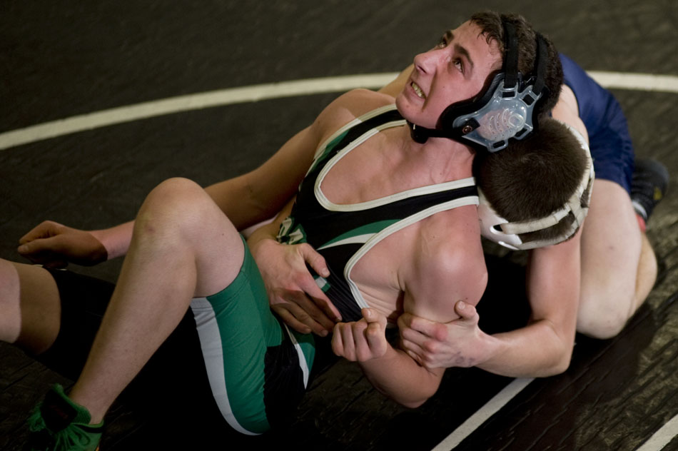 Eureka's Brian Spurgeon reacts as he avoids a pin from Notre Dame's Mitch Price during a tournament on Saturday, Dec. 4, 2010, at Notre Dame High School.