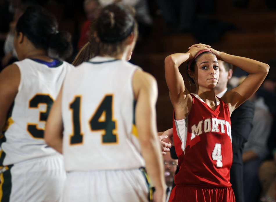 Morton's Lexi Ellis (4) reacts after the team committed a turnover in the second half of a game on Thursday, Dec 2, 2010, at Richwoods High School.