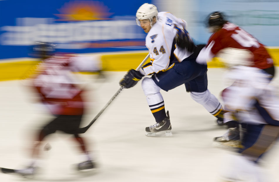 Peoria Rivermen defender Brennan Evans (44) advances the puck as he skates through the Lake Erie defense during a game on Sunday, Dec. 19, 2010, at Carver Arena. Peoria won 4-0.