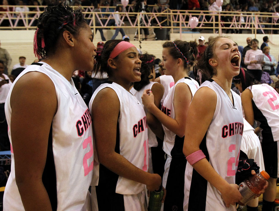 Cheyenne East's Savannah Minder, right, reacts after East defeated Central 45-39 during a game on Saturday, Jan. 22, 2011, at Storey Gym.