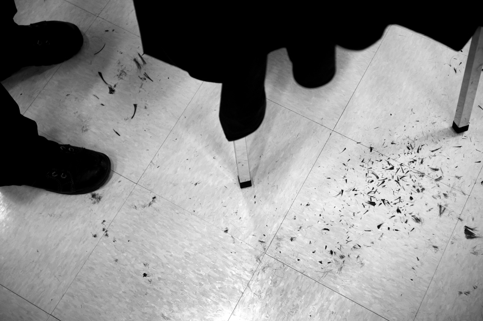 Clips of hair lay on the floor as Sunrise Elementary students donate to Locks of Love on Friday, Jan. 28, 2011, at the school. After locks were cut off, salon students styled hair for the students.
