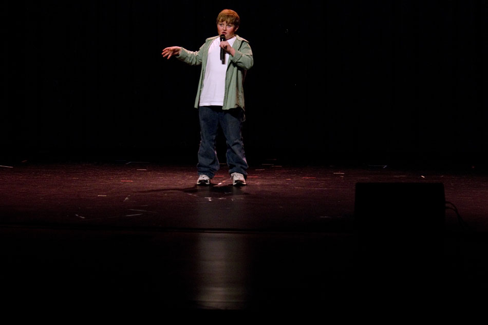 Ryan Huylar, a 7th grader at McCormick Junior High, performs a stand up comedy bit during Stars of Tomorrow on Saturday, Jan. 29, 2011, at Central High School.