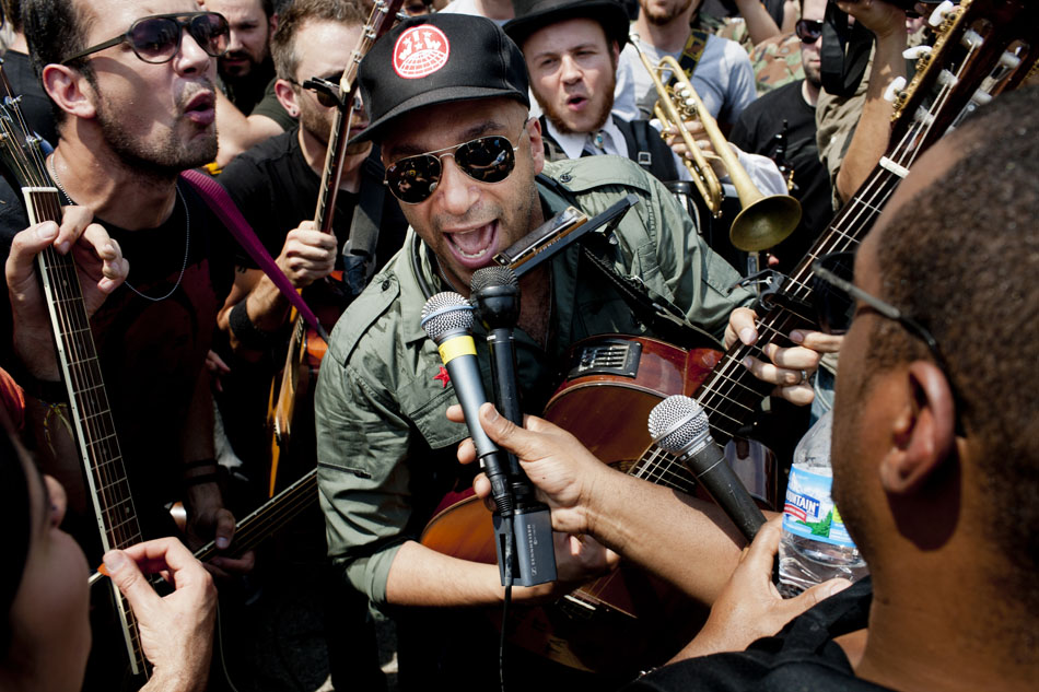 Tom Morello, the former Rage Against the Machine guitarist, performs during a NATO Summit Protest on Sunday, May 20, 2012, at Grant Park in Chicago. Despite pleas from organizers, Morello insisted on performing amidst a large group of people. (Photo by James Brosher)