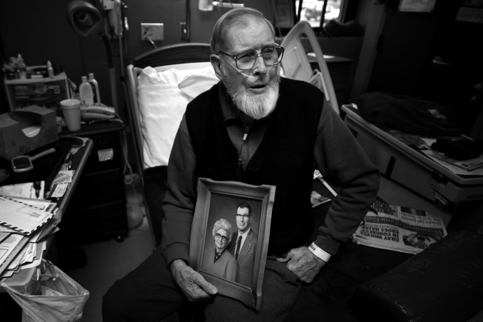 Francis Oline holds a portrait of himself and his late wife, Dolorus, as he reflects on a few memories on Friday, Feb. 4, 2011, at the VA Medical Center in Cheyenne. Oline, who is 90, was married to his wife for 57 years until her death in 1998.