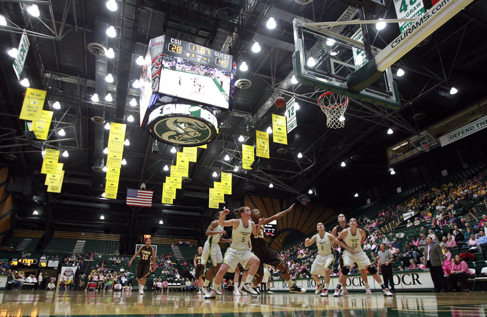 Wyoming and Colorado players battle for a rebound during a game on Saturday, Feb. 5, 2011, in Fort Collins.