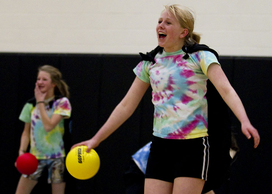 Stu Cobras player Meghan Chritchley reacts after her team knocked out an opposing player during a charity dodgeball tournament on Tuesday, Feb. 8, 2011, at East High School. The tournament benefited the Denver Children's Miracle Network.