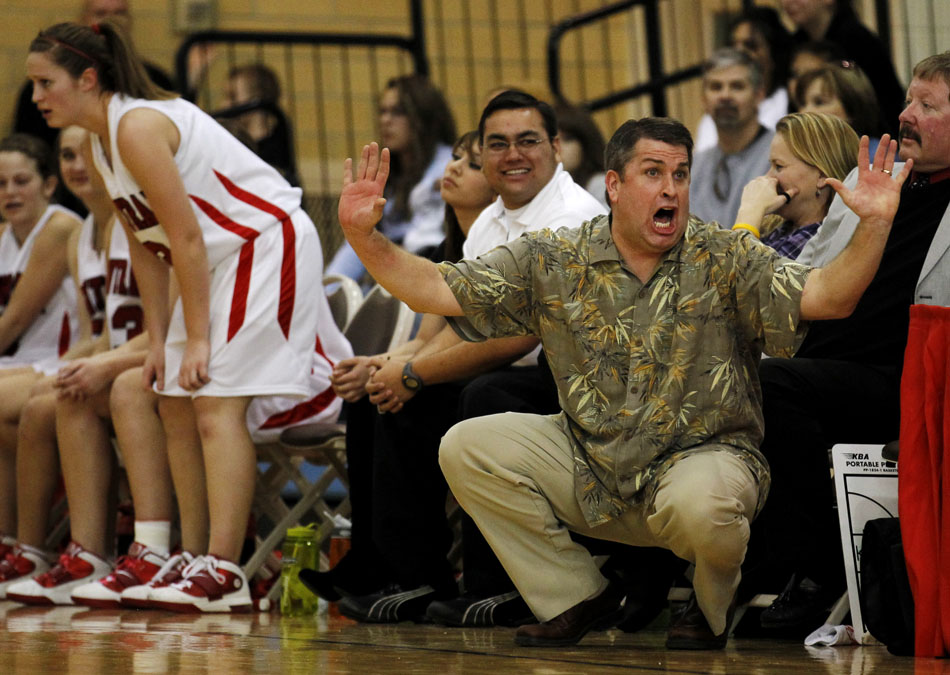 Central coach Chad Whitworth argues with an official about a call during a game on Saturday, Feb. 12, 2011, at Storey Gym in Cheyenne. Central won 59-51.