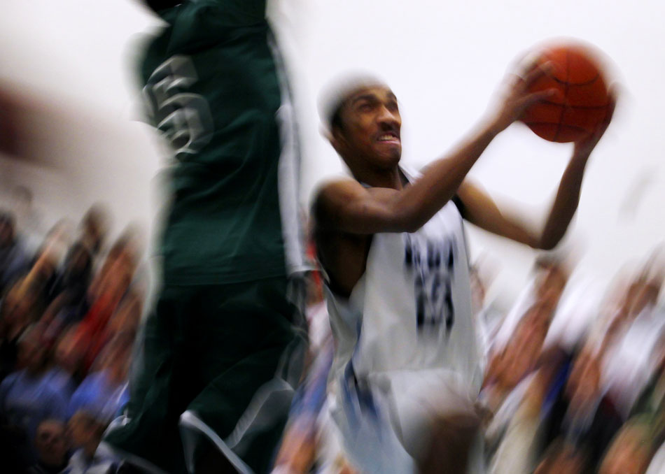 Cheyenne East's Ramon Robinson goes in for a lay up during a game against Kelly Walsh on Thursday, Feb. 17, 2011, at East High School.