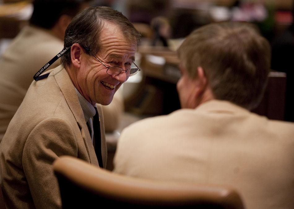 Rep. Jim Roscoe, D-Wilson, shares a laugh with Rep. Dave Zwonitzer, R-Cheyenne, after the House passed SF0146, the Teacher Accountability Act, after a third reading on Wednesday, Feb. 23, 2011, at the Wyoming State Capitol in Cheyenne. The bill passed 52-4 with 4 members excused.
