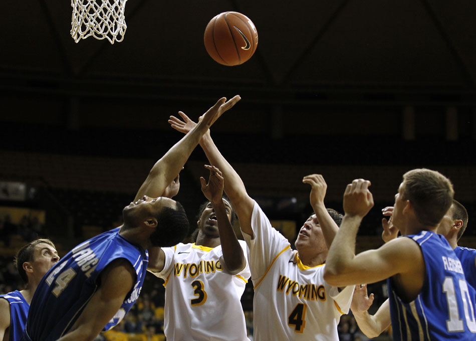 Air Force forward Derek Brooks (24) watches as a rebound goes over his head and out of his control during a NCAA men's basketball game on Wednesday, Feb. 23, 2011, in Laramie, Wyo.