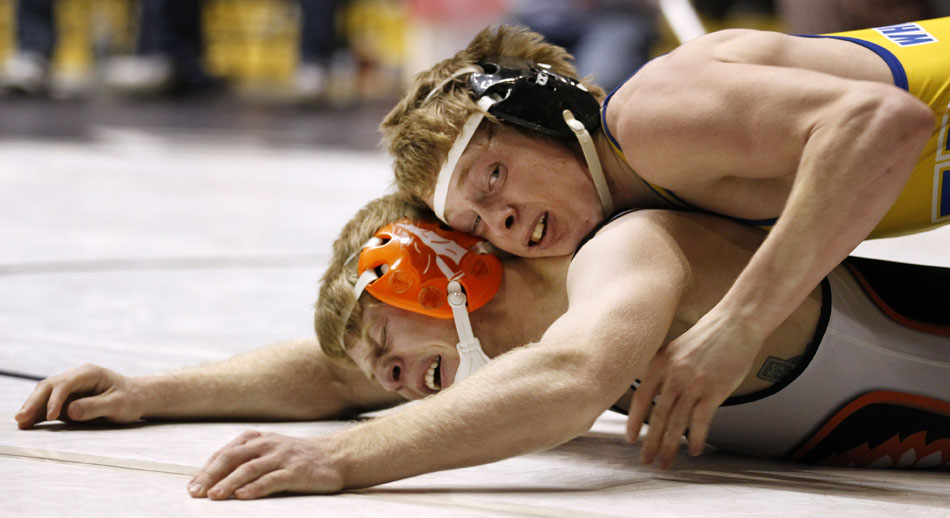 Wheatland's Andrew Blumer, top, wrestles with Worland's Austen Summerville during a match in the 135 pound class 3A bracket on Friday, Feb. 25, 2011, in Casper, Wyo. Summerville won the match.