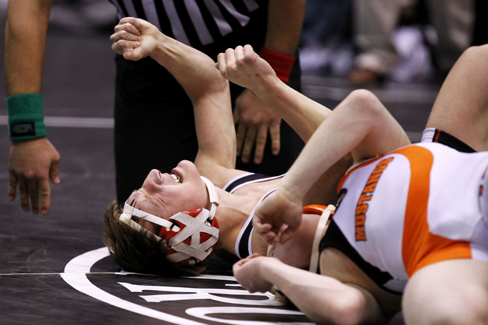 Cheyenne Central's Austin Vye reacts after pinning Natrona County's Brandon Kussy in the Class 4A 112 pound third place match on Saturday, Feb. 26, 2011, in Casper, Wyo.