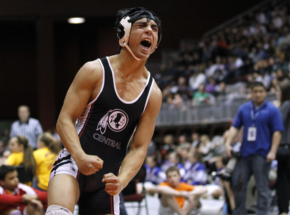 Cheyenne Central's Austin Breckenridge celebrates after defeating Natrona County's Caleb Rhoades during the Class 4A 152 pound final on Saturday, Feb. 26, 2011, in Casper, Wyo.