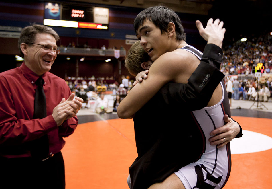 Cheyenne Central's Austin Breckenridge celebrates after defeating Natrona County's Caleb Rhoades during the Class 4A 152 pound final on Saturday, Feb. 26, 2011, in Casper, Wyo.