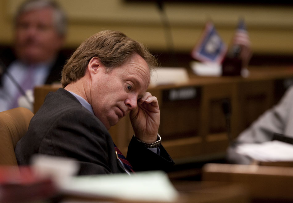 Sen. Ray Peterson, R-Cowley, llistens to debate on HB0147 (Excise tax-vendor compensation) on Tuesday, March 1, 2011, on the floor of the Senate chambers at the Wyoming State Capitol in Cheyenne. The bill passed 23-6 after a third reading.